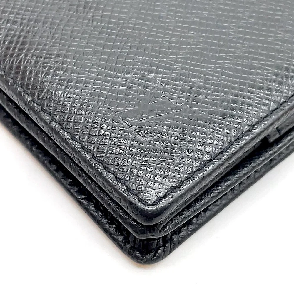 LOUIS VUITTON Black Taiga Porte Monnaie Boite COMES WITH: LV BOX, DUST BAG